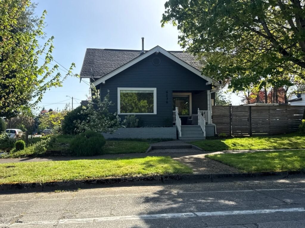 Craftsman-style home in Vancouver, WA with well-maintained shingle roof